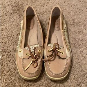 Sperry gold boat shoes.